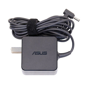 Compact ASUS 19V charger on desk with cable extended