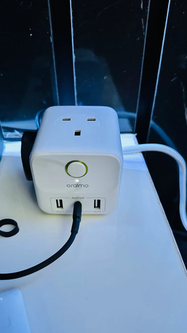 Compact Oraimo PowerCube extension charging multiple devices