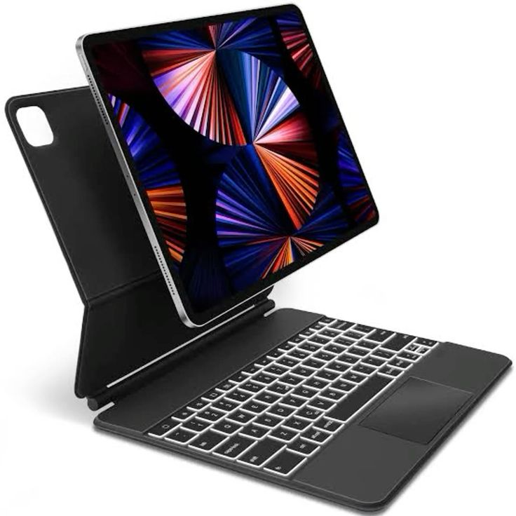Magic Keyboard backlit keys and trackpad close up