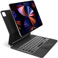 Magic Keyboard backlit keys and trackpad close up