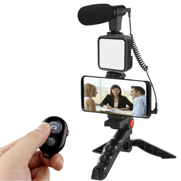 Smartphone vlogging video making kit setup with tabletop tripod, shotgun microphone, and LED light