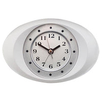 A wall-mounted digital clock with a white frame and a black analog face.