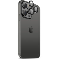 A rear view of an iPhone with a camera lens cover attached to the camera module.