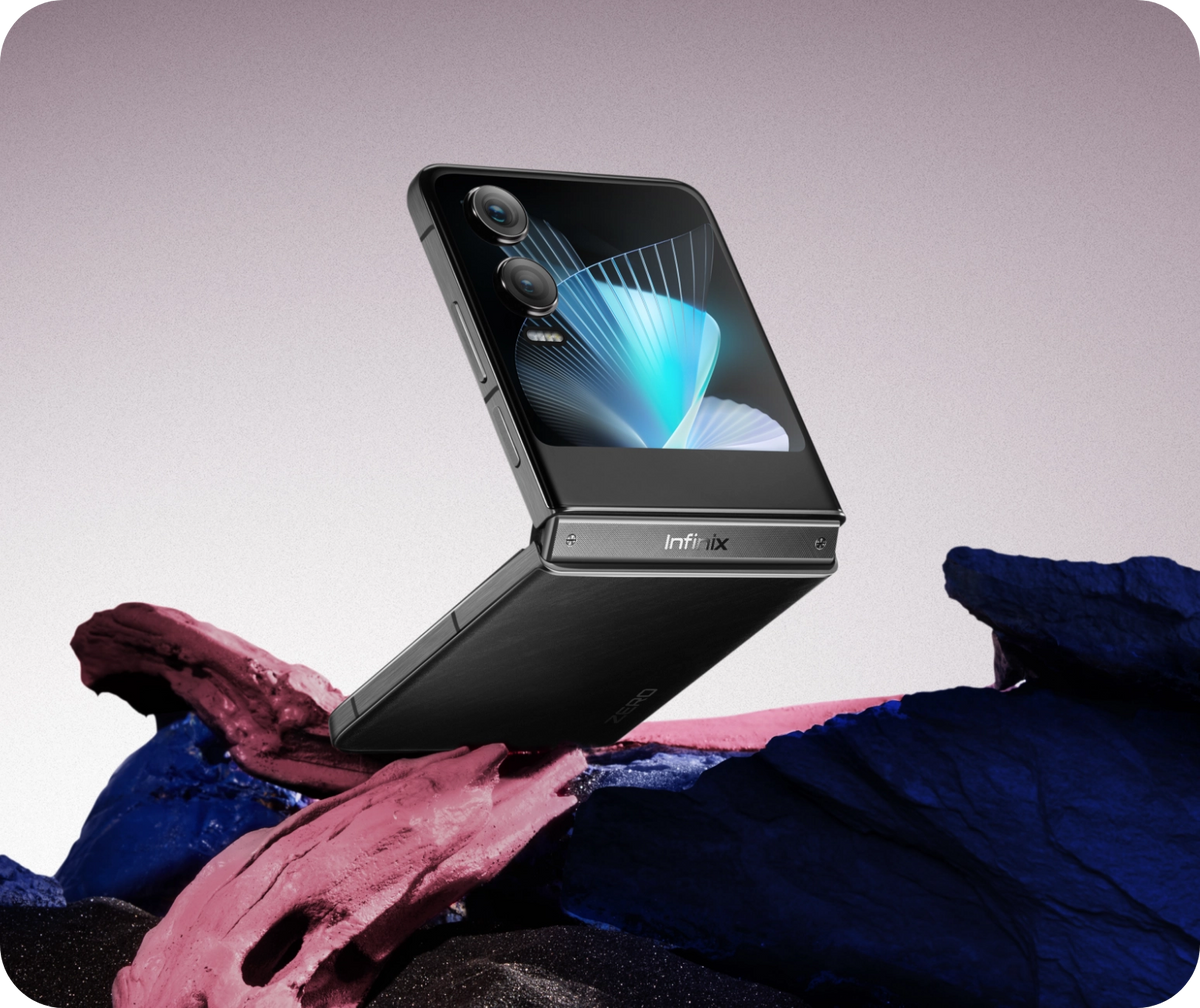Infinix Zero Flip in Rock Black closed, cover screen facing up on a rock