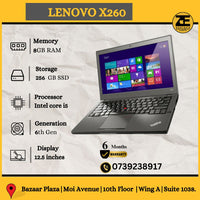 Lenovo Thinkpad X260 laptop with a 12.5 inch display, shown open and displaying Windows desktop screen, in black color.