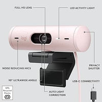 Logitech Brio 500 pink webcam with full HD lens, LED activity light, noise reducing mics, privacy shutter, and USB-C connectivity.