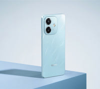 OPPO A3x standing in Ocean Blue on a block, rear camera view