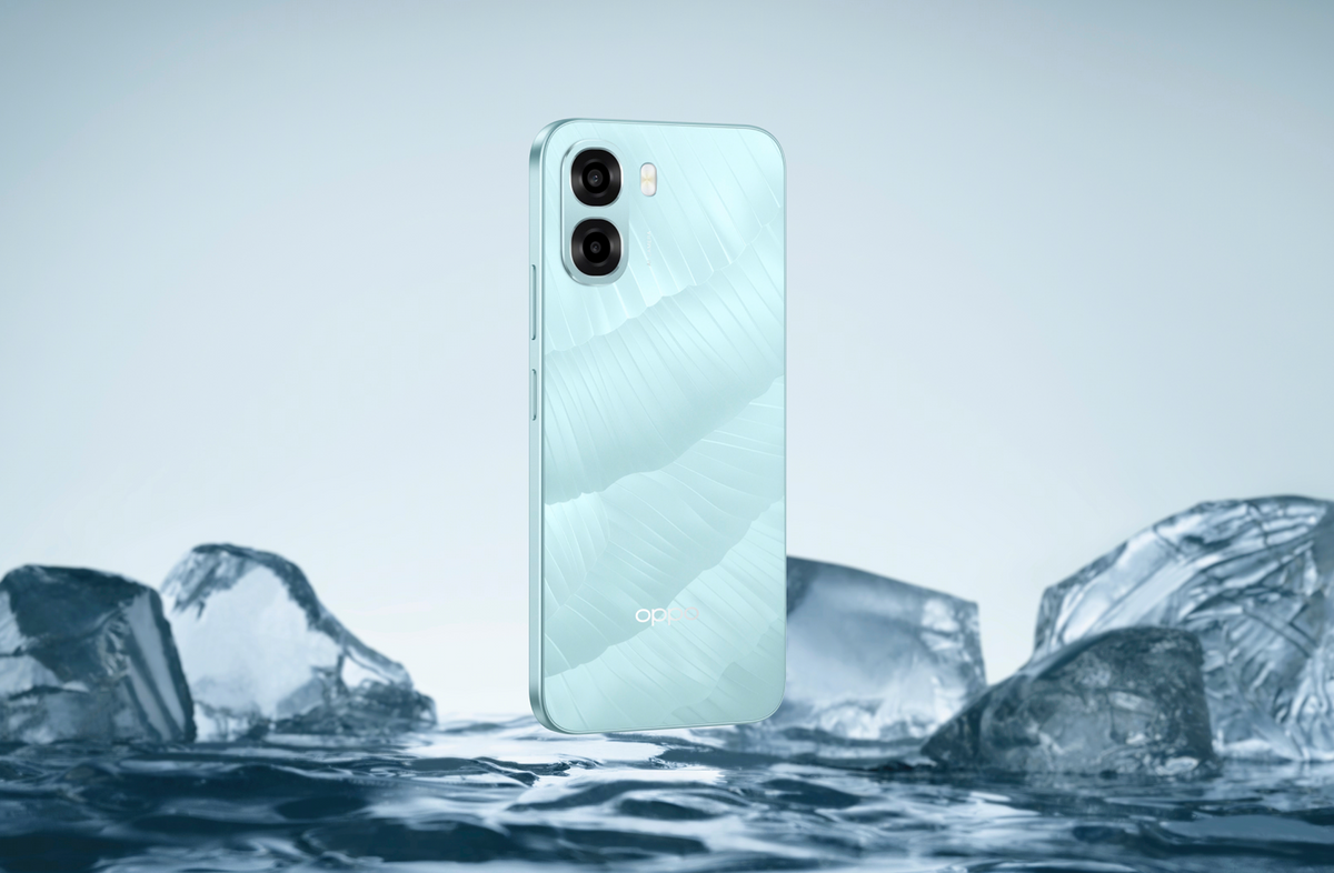OPPO A6x back in Ice Blue standing among ice, showing the 13MP camera