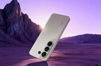 Tecno Camon 50 Pro in nebula titanium, back view in a desert landscape