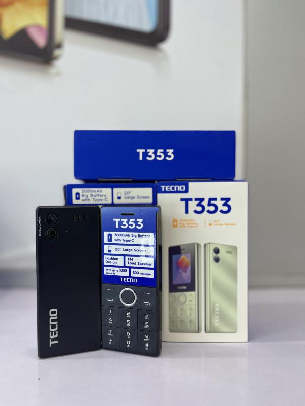 TECNO T353 feature phone displayed with focus on its 2.0" screen, dual SIM slots with it's packaging box displayed