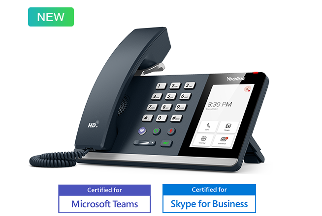 User operating the Yealink MP54 Teams Edition in a modern office