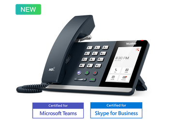 User operating the Yealink MP54 Teams Edition in a modern office